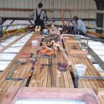 Haven Boatworks crew works on finishing a deck. Photo courtesy First Fed