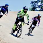 From left, Sean Tamburro of Port Angeles, Ben Mriglot of Shelton and Jeremy Kerr of Orting race in Sundays state qualifier at the Lincoln Park BMX track. (Dave Logan/for Peninsula Daily News)