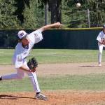 Wilder AAs Hunter Stratford pitches against Wilder A in a game Sunday afternoon at Volunteer Park. In the background is Wilder AA first baseman Rylan Politika. (Dave Logan/for Peninsula Daily News)