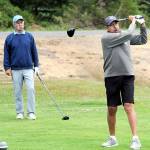 KEITH THORPE/PENINSULA DAILY NEWS
Gary Valencia of Port Angeles, right, tees off at the start of the Clallam County Amateur tournament on Friday at Peninsula Golf Course as Scott Hendricks, also of Port Angeles, awaits his turn.