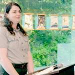 KEITH THORPE/PENINSULA DAILY NEWS
Olympic National Park Arist-in-Residence Program manager Eliza Goode provides an introduction to "Terminus: A Glacier Memorial Project" during an opening reception for a collection more than 40 art pieces themed around the effects of climate change on glaciers on Friday at the Port Angeles Fine Arts Center. Most most of the installations will be exhibited at the fine arts center through Sept. 3. The center is open from 11 a.m. to 5 p.m. Thursdays through Sundays.