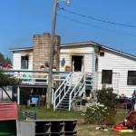 Damage from a July 9 fire can be seen at this residence on the 300 block of Thornton Drive. (Chris Turner/Clallam County Fire District 3)