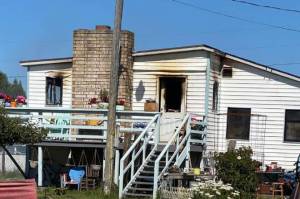 Damage from a July 9 fire can be seen at this residence on the 300 block of Thornton Drive. (Chris Turner/Clallam County Fire District 3)
