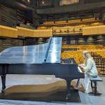 Katya Grineva performs a sound check in the Donna M. Morris Theater on Friday afternoon in preparation for a concert on Sunday. (Steve Raider-Ginsburg/Field Hall executive director)