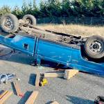 A 1983 Ford Ranger blocks the eastbound exit off Highway 101 at River Road in Sequim on Monday after the driver lost control of the vehicle. The driver, a 26-year-old Port Hadlock man, was medevacked to Harborview Medical Center in Seattle. (Courtesy photo /. Clallam County Fire District 3)
