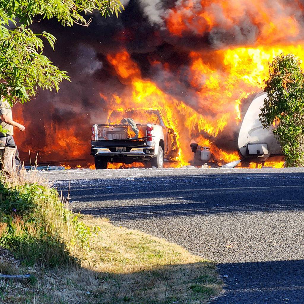 Flames erupted when a house on June Place exploded Tuesday evening. (Steve Carpenter)