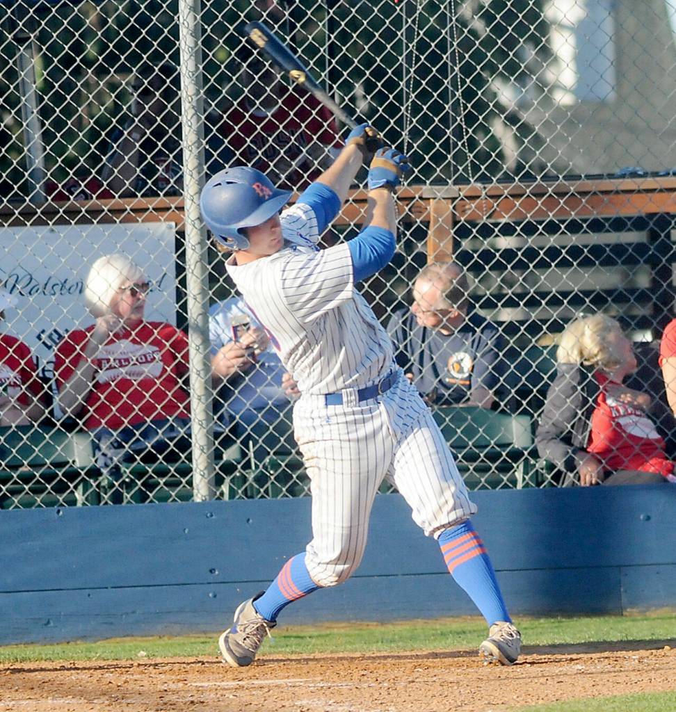 Lefties catcher Chase Taylor swings for a double in the fourth inning on Wednesday against Kamloops in Port Angeles.
KEITH THORPE/PENINSULA DAILY NEWS