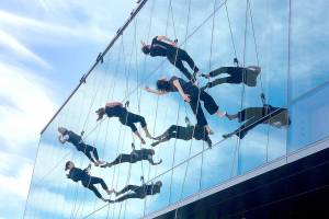 Members of the BANDALOOP vertical dance troupe practice a routine on the side of the Field Arts & Events Hall in Port Angeles on Wednesday. The group will take part in the venues official grand opening celebration this weekend with three free public performances on Saturday at noon, 6 p.m. and 7:30 p.m. For more about the grand opening weekend, see Page A4. (Keith Thorpe/Peninsula Daily News)