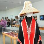 A mannequin displays a Native Amerian ceremonial coat and woven hat dedicated to the late Jamestown SKlallam leader Kurt Grinnel during a gallery opening of Klallam crafts on Thursday at the Field Arts & Events Hall in Port Angeles. (KEITH THORPE/PENINSULA DAILY NEWS)