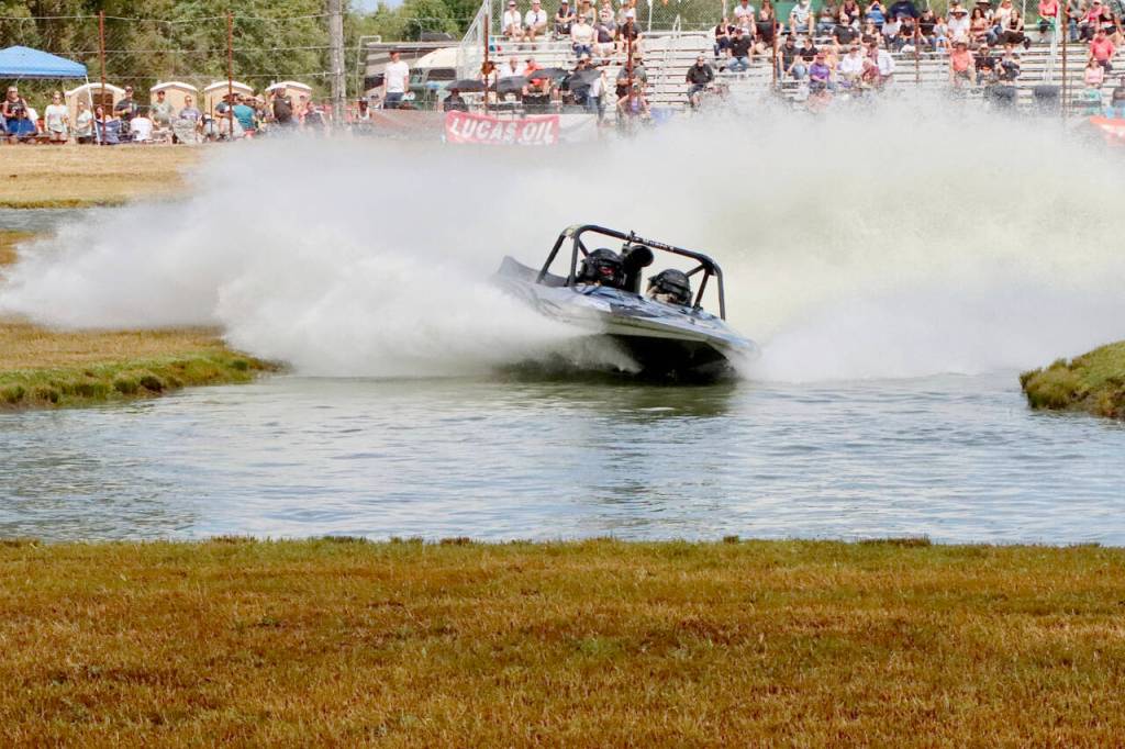 Kiwi No. 35, driven by Chris Munro of Queensland, New Zealand, and navigated by Katie Munro of New Zealand, competes in the unlimited class of the American Sprint Boat Racing event Sunday at the Extreme Sports Park outside of Port Angeles. The event was expanded to two days to accommodate a total of 38 teams competing in unlimited, modified and 400 classifications. The Munros are previous winners at the Extreme Sports Park. For final results, go to cmg-northwest2.go-vip.net/peninsuladailynews or look in Tuesdays sports section. The sprint boats will return to ESP on Sept. 9-10. (Dave Logan/for Peninsula Daily News)