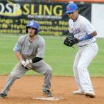 KEITH THORPE/PENINSULA DAILY NEWS
Lefties second baseman Roberto Nunez, right, looks for an opportunity to tag out Springfield's Dawson Santana at second on Friday night in Port Angeles.