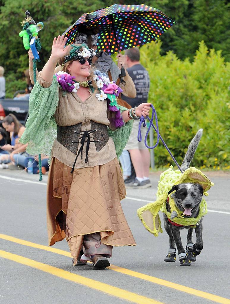 Debbie DeLuna, dressed as Princess Dris, the Scottish/English translation of blackberry briar, and her dog, Zuko, march in Saturdays Joyce Daze parade. (Keith Thorpe/Peninsula Daily News)