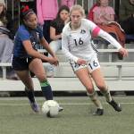 Peninsulas Sydney Soskis, right, gets into a rundown with Bellevues Haleigh Macugay during an October 2022 game.