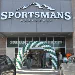 The first customers at Sequims Sportsmans Warehouse go inside during its grand opening. (Matthew Nash/ Olympic Peninsula News Group)