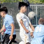 KEITH THORPE/PENINSULA DAILY NEWS
Peninsula's Matthew Enriquez, center, tries to settle the ball while surrounded by Pierce's Roel Degollado, left, and Payton Lambdin, right, and teammate Don Vaios Dovas, rear, during Saturday's match in Port Angeles.