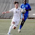 KEITH THORPE/PENINSULA DAILY NEWS Peninsulas Pau Vivas outruns Edmonds Maka Mahureva on Wednesday at Wally Sigmar Field in Port Angeles.