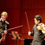 Music on the Strait cofounders James Garlick, left, and Richard O'Neill, pictured rehearsing, are bringing the festival to Field Arts & Events Hall and Maier Hall this week. photo by Diane Urbani de la Paz/For Peninsula Daily News