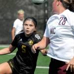 Peninsulas Taya Bpohenko, left, looks for control as North Idahos Cora Anderson looks back during Saturdays friendly at Wally Sigmar Field in Port Angeles. (Keith Thorpe/Peninsula Daily News)