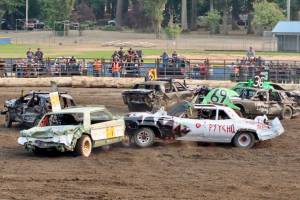 The demolition derby was the last event Sunday of the Clallam County Fair in Port Angeles and lived up to expectations with large crowds watching cars smashing into each other in several divisions. (Dave Logan/for Peninsula Daily News)