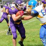 Steve Mullensky/for Peninsula Daily News
Quilcene’s Mason Iverson, left, fights for yardage during a Sept. 2022 game against Crescent. Iverson led the Rangers in rushing yards last season and returns at fullback for Quilcene.