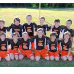The Joyce Browns YMCA NFL flag football team just wrapped up an 11-0 season, scoring 326 points and giving up just 24. The players are, from left, back row, Robert Palmer, Liam Sprague, Teyen Thomas, Boe Horejsi, Kolton Mason, Quinn Svenson. From left, front row, are Desmond Sprague, Colton Sage, Colby Horejsi, Wyatt Bauers, Jude Sprague and Levi Palmer. The coaches are Ryan Sage and Brian Shimko. Not in the photo are players James Spears and Shadow Ellis. (Courtesy photo)