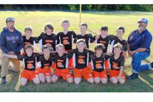 The Joyce Browns YMCA NFL flag football team just wrapped up an 11-0 season, scoring 326 points and giving up just 24. The players are, from left, back row, Robert Palmer, Liam Sprague, Teyen Thomas, Boe Horejsi, Kolton Mason, Quinn Svenson. From left, front row, are Desmond Sprague, Colton Sage, Colby Horejsi, Wyatt Bauers, Jude Sprague and Levi Palmer. The coaches are Ryan Sage and Brian Shimko. Not in the photo are players James Spears and Shadow Ellis. (Courtesy photo)