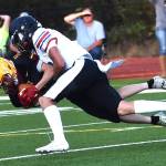 East Jefferson's Cash Holmes made a hard tackle against Kingston in Kingston on Friday night. (Nicholas Zeller-Singh/Kitsap News Group)