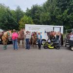 At the Joyce Daze Parade, participating Back Country Horsemen Peninsula Chapter members were awarded a Blue Ribbon for the best Animal Entry in the parade. (PHOTO BY LINDA MORIN)