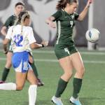 KEITH THORPE/PENINSULA DAILY NEWS Port Angeles Cayleigh Alward, right, settles a loose ball as Olympics Lili Diaz closes in during Thursdays match in Port Angeles.