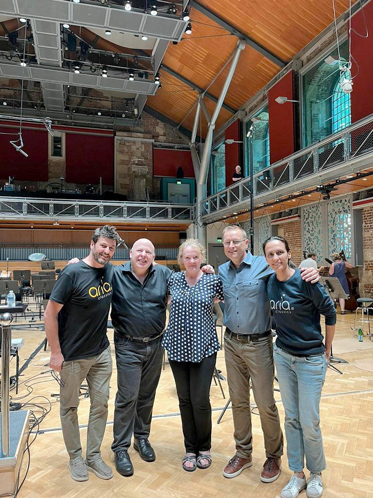 At the London Symphony Orchestras home venue in England, an international team of musicians recorded the Port Angeles Symphonys Concerto for Double Bass and Orchestra: from left, producer Fernando Aria of Spain; Port Angeles Symphony conductor Jonathan Pasternack; composer Sarah L. Bassingthwaighte; double bassist Steve Schermer and the producers partner, Ines Aria. (Port Angeles Symphony)