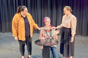 In "To The Moon" are, from left, Marissa LaJambe, Cheryl Koenig and Janie Rhodes, all of Port Angeles, at a recent rehearsal.