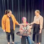 In To The Moon are, from left, Marissa LaJambe, Cheryl Koenig and Janie Rhodes, all of Port Angeles, at a recent rehearsal.
