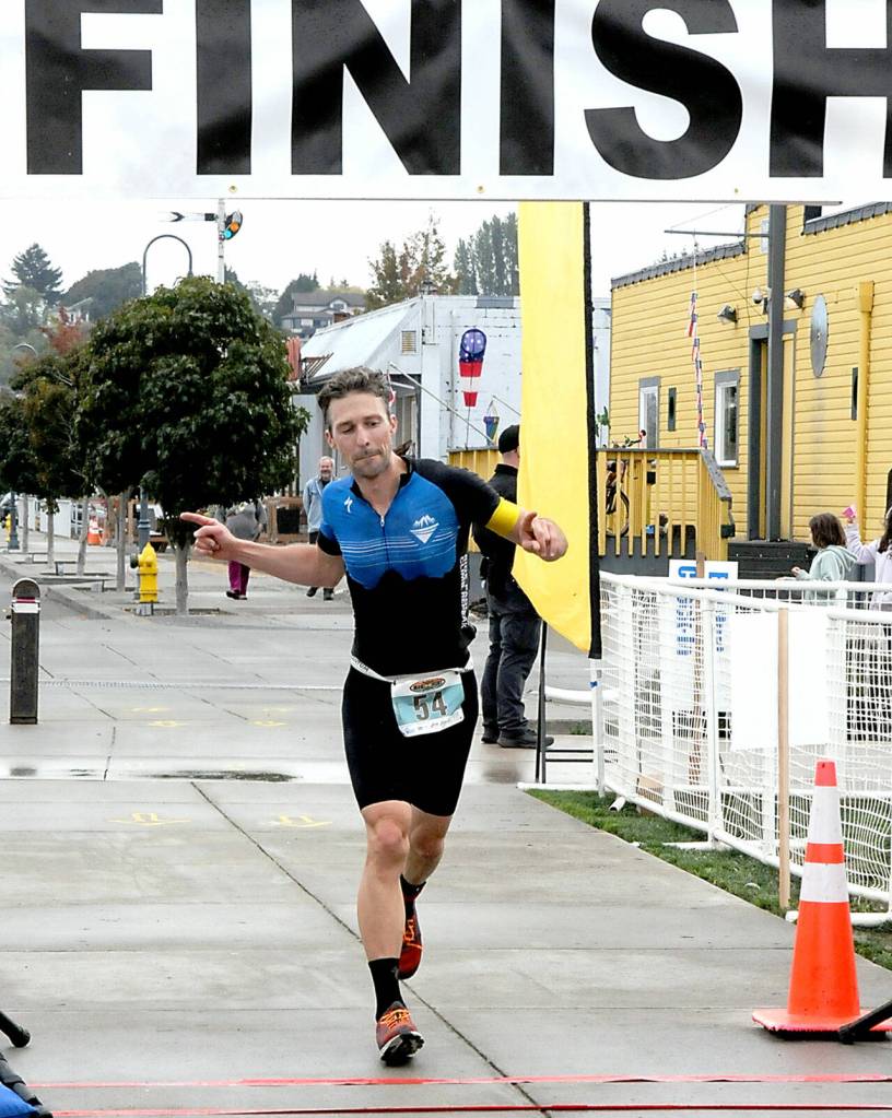 KEITH THORPE/PENINSULA DAILY NEWS Ironman Troy Treaccar of Port Angeles finishes first in Saturdays Big Hurt.