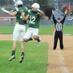 KEITH THORPE/PENINSULA DAILY NEWS Port Angeles Blake Sohlberg, left, and Kason Albaugh celebrate in the end zone after Sohlberg darted for the across for a touchdown in the first quarter on Friday against Olympic in Port Angeles.