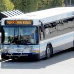 A Clallam Transit bus destined for Hurricane Ridge in Olympic National Park prepares to depart The Gateway transit center in downtown Port Angeles on Tuesday. (KEITH THORPE/PENINSULA DAILY NEWS)