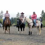 High school friends and equestrian team members Aby Garcia, left, Keri Tucker and Joanna Seelye enjoyed racing through the unusual game patterns and supporting the fundraiser. (Karen Griffiths/for Peninsula Daily News)