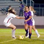 Sequims Raimey Brewer looks forward after outmaneuvering Kingstons Emma Matteson for the ball during the Wolves 4-0 win Tuesday. (Michael Dashiell/Olympic Peninsula News Group)