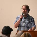 Joe Donisi, an engineer with the Clallam County Road Department, gives details on the four options of the lower Dungeness levee at a public meeting in Sequim. (Michael Dashiell/Olympic Peninsula News Group)