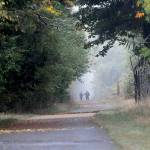 Walkers make their way along a foggy portion of the Olympic Discovery Trail near William R. Fairchild International Airport in Port Angeles. Areas of fog covered many portions of the North Olympic Peninsula on Thursday with wetter weather forecast for the weekend. (Keith Thorpe/Peninsula Daily News)