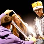 Sequim High School Homecoming Queen Taryn Johnson, left, receives a sash at Friday nights football game while king Sage Younger looks on. Sequim shut out North Mason 36-0. (Michael Dashiell/Olympic Peninsula News Group)