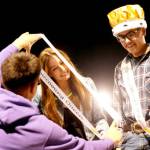 Sequim High School Homecoming Queen Taryn Johnson, left, receives a sash at Friday nights football game while king Sage Younger looks on. Sequim shut out North Mason 36-0. (Michael Dashiell/Olympic Peninsula News Group)