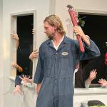 Justin Stapleton, as Ben, attempts to survive a horde of zombies coming through the windows in Olympic Theatre Arts Night of the Living Dead. The OTA show opens tonight and runs through Halloween evening. (Matthew Nash/Olympic Peninsula News Group)