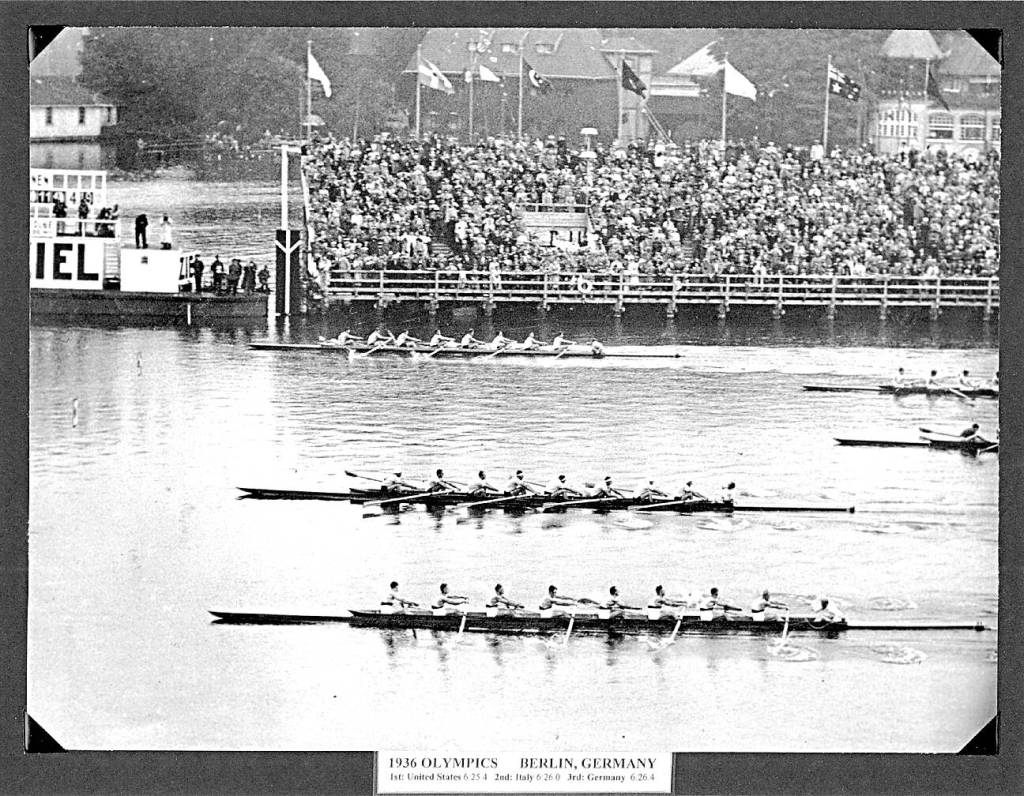 The American eight-man crew (foreground) edges Italy (center) by eight feet, securing the USAs gold medal in the 1936 Olympic Games. (Photo courtesy of Joe Rantz/Judy Willman)
