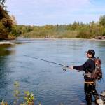 Dancen Charles, a member of the Lower Elwha Klallam Tribe, fishes the Elwha River, which is open only to tribal fishermen. A quota of 400 fish can be taken by pole and later by netting, with future quotas determined by the Northwest Indian Fisheries Commission. (Dave Logan/for Peninsula Daily News)