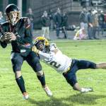 Kody Christen/The [Centralia] Chronicle
Napavine's Colin Shields hauls in a touchdown catch while Forks' Noah Foster defends during Napavine's 52-8 win over Forks on Thursday. Colin Shields makes a touchdown catch during a Napavine win over Forks 52-8 Oct. 26.