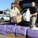 Helen Kenoyer of the Olympic Peninsula Community Clinic and Inspector Josh Ley of the Clallam County Sheriffs Office unload unwanted pharmaceuticals and medications from the agency at a drop-off point at the Clallam County Courthouse during Saturdays National Prescription Drug Take Back Day. At the event, people were allowed to get rid of unwanted or expired drugs for disposal in a safe and responsible manner. Additional drop-off points on Saturday were at Sequim City Hall and the QFC grocery store in Port Hadlock. Year-round drug disposal sites are kiosks at the Clallam County Sheriffs Office in Port Angeles, at the Sequim Police Department and through the Jefferson County Sheriffs Office in Port Hadlock. (Keith Thorpe/Peninsula Daily News)