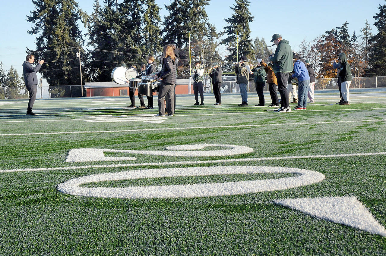 Members of the Port Angeles High School Band perform on the new pitch during Saturdays dedication ceremony for the Port Angeles School Districts Monroe Athletic Field. (Keith Thorpe/Peninsula Daily News)