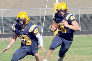 Forks Walker Wheeler, left, and Nate Dahlgren, right, made the first team of the Central 2B North Division as defensive players. They also made the second team as offensive players. (Lonnie Archibald/for Peninsula Daily News)