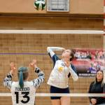 Forks Chloe Gaydeski eyes the ball as she prepares to send a spike over the net during the Spartans 3-1 win over Toledo on Wednesday during the Class 2B District 4 Tournament. (Josh Kirshenbaum/The Chronicle)