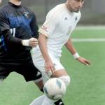 Peninsulas Manny Garcia, right, tries to get past the defense of Clarks Jared Armenta-Reyes on Saturday at Peninsula College. (Keith Thorpe/Peninsula Daily News)